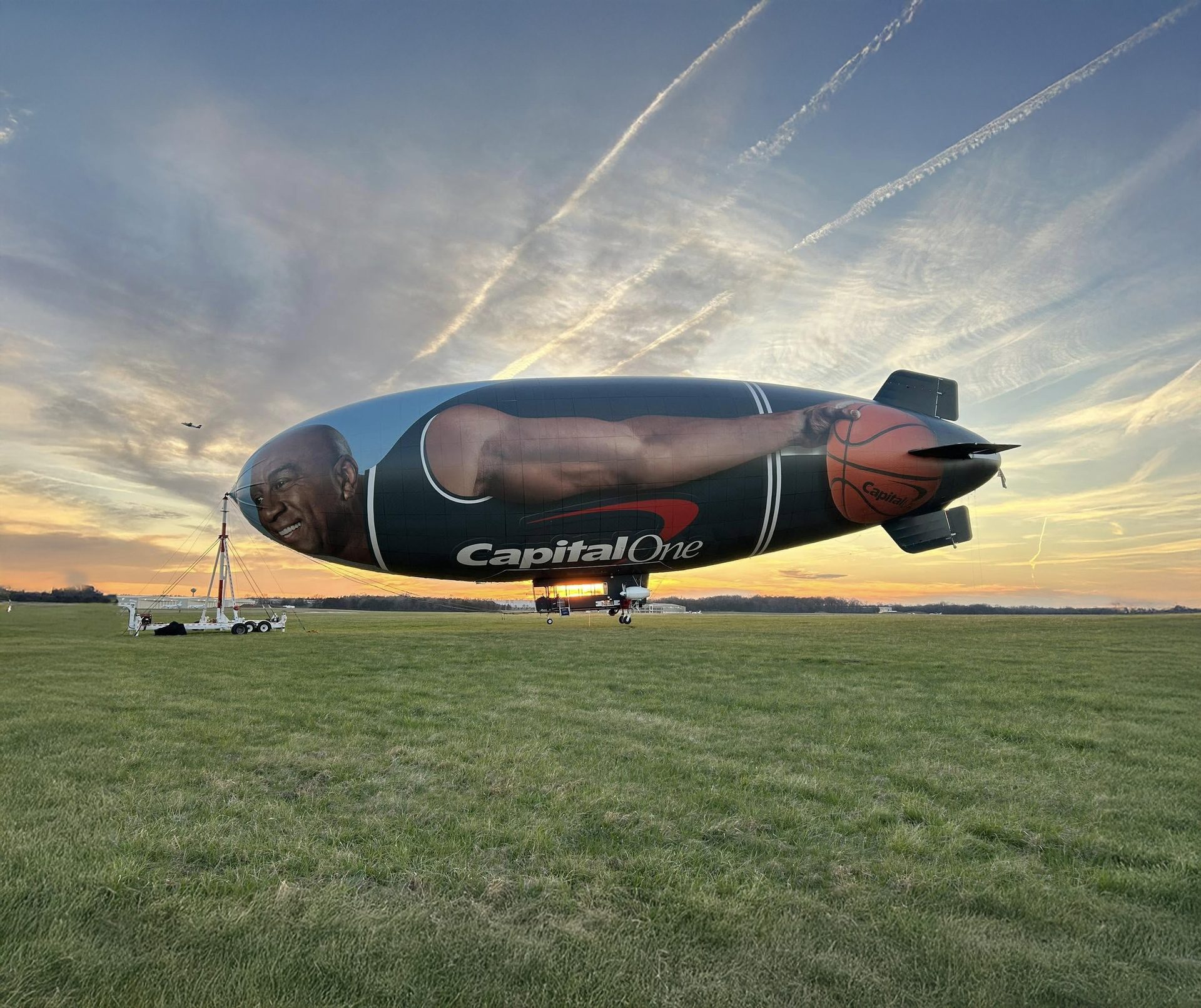 Capital One March Madness blimp with Magic Johnson